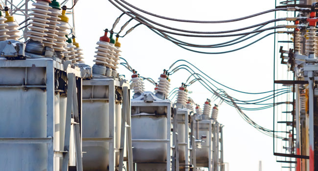 High voltage electric power substation in winter day